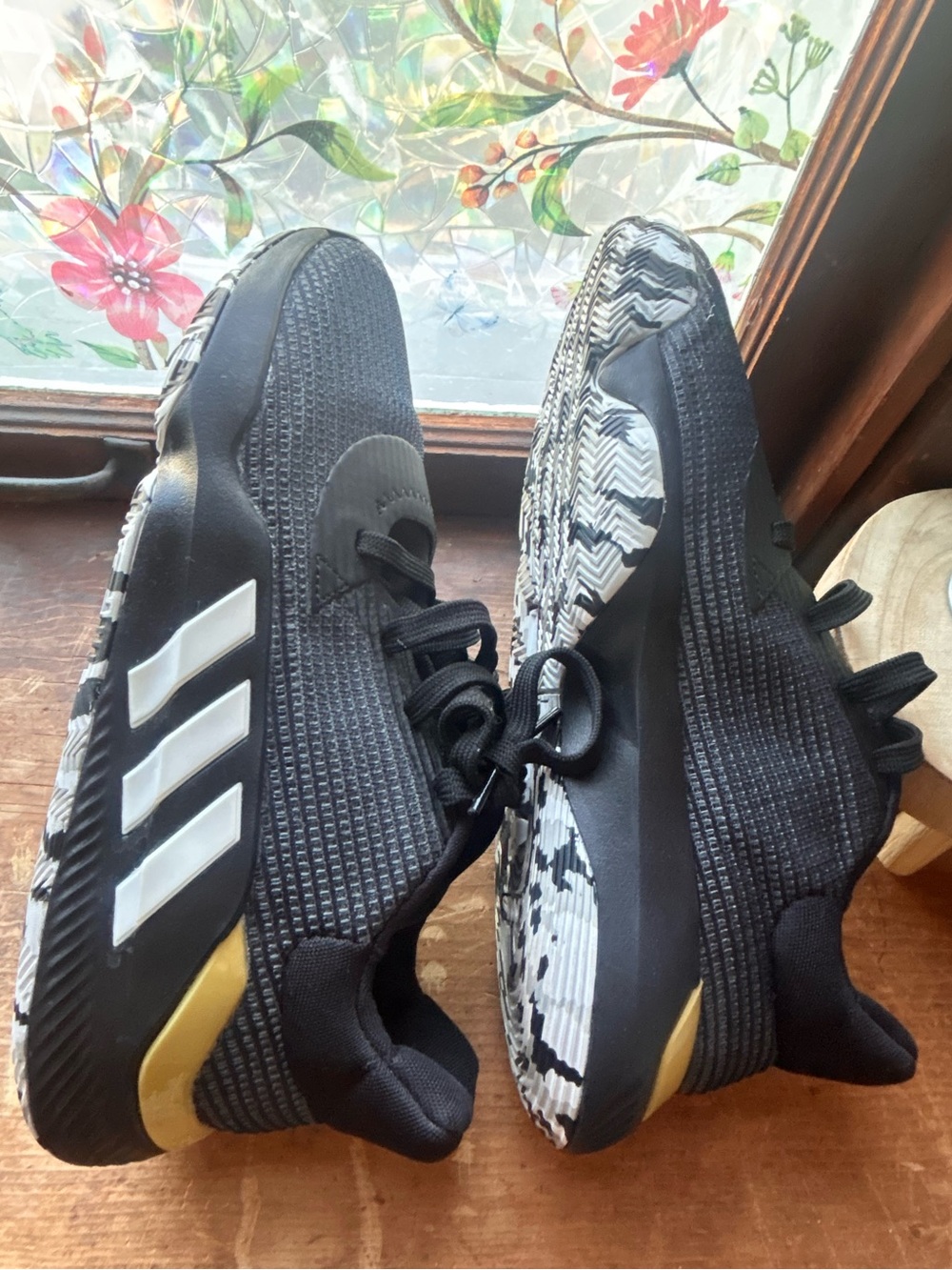 adidas Black Sneakers with White Stripes and Gold Accent